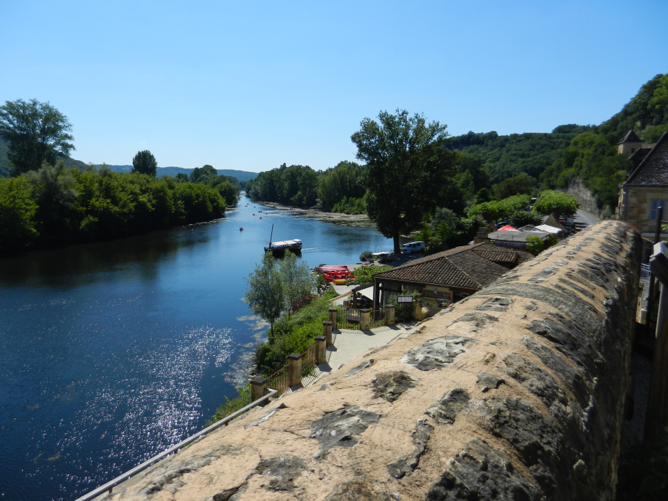 And to close our visit off some more canoes with a sightseeing boat in the foreground.